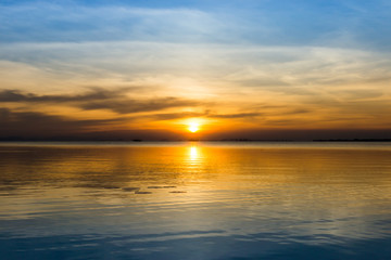 Naklejka na ściany i meble Sunset sky on the lake