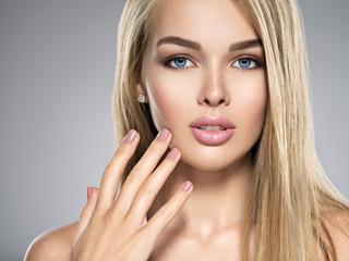 Fototapeta premium Young Woman with healthy skin of a face