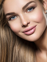 Fototapeta premium Beautiful young woman with long straight hairs