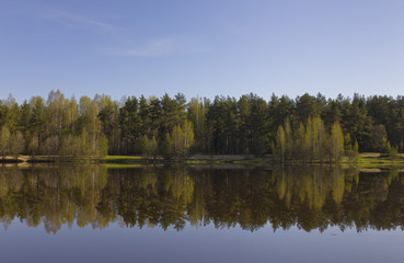 Fototapeta na wymiar Lake in a calm morning