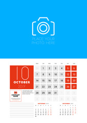 Wall calendar planner template for October 2019. Week starts on Monday. Vector illustration