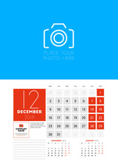 Wall calendar planner template for December 2019. Week starts on Monday. Vector illustration