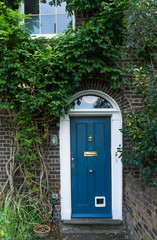 London, UK - typical english wooden front door