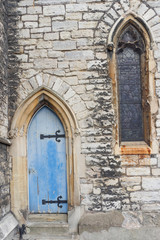 Fototapeta na wymiar Characteristic old gothic door and window, London, England