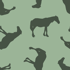 Seamless pattern. Silhouette of a horse.
