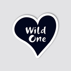 Silhouette of heart with hand drawn lettering inside. Creative sticker for travelling design. Wild one. Vector illustration.
