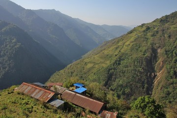View from a place near Chomrong, Nepal. Rural landscape with terraced fields.