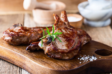 Roasted veal chops with herbs - obrazy, fototapety, plakaty