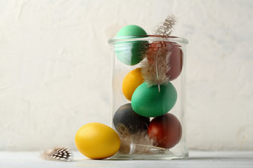 Colorful easter eggs with feathers