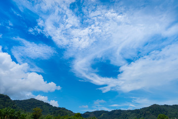  Cloud in blue sky .Fluffy cloud in summer season  over the mountain daytime.