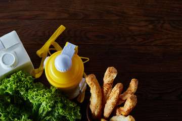 Healthy lunch prepared in small plastic container, top view, close-up.
