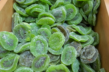 Dried kiwi in wooden box for sale at local city market