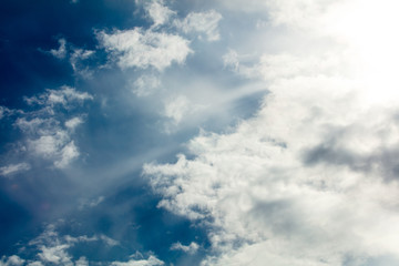 Clouds on a blue sky as a background