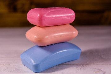 Pieces of the soap on wooden table