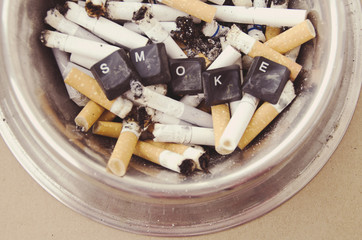 cigarette butts in an ashtray