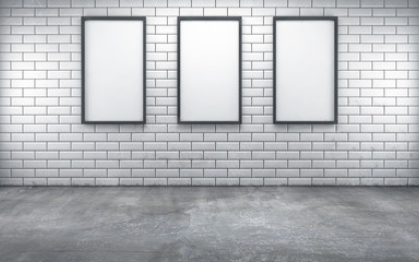 room with three blank frames on white wall. 3d rendering