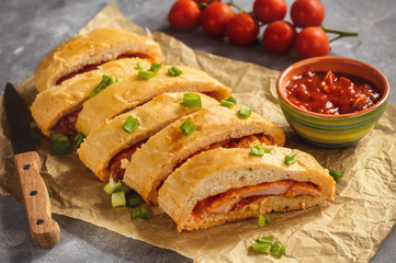 Ham and cheese stromboli, italian cuisine.