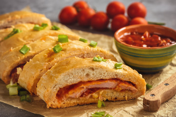 Ham and cheese stromboli, italian cuisine.