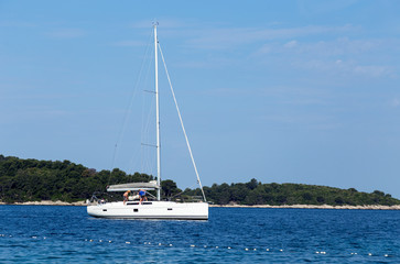 Fototapeta na wymiar Luxury yacht or boat cruising at sea