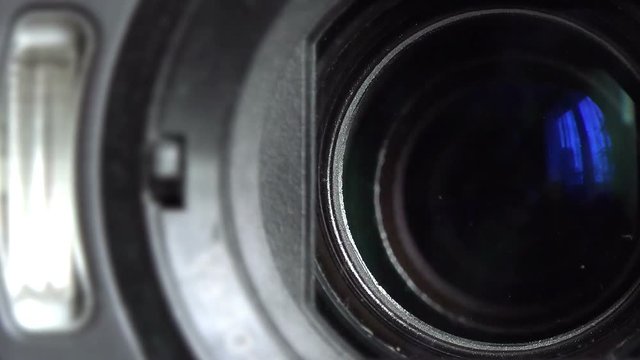 Close-up View of Zooming Camera Lens in a Digital Photo Camera
