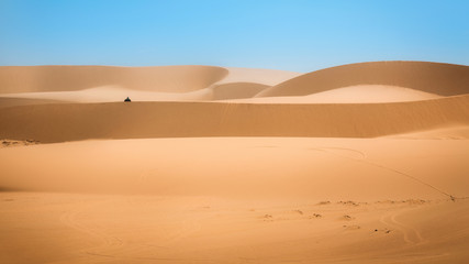 Fototapeta na wymiar White sand dune desert in Mui Ne