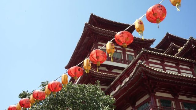 Buddha Tooth Relic temple and Museum and chinese lanterns in Chinatown at Singapore city. Famous national landmark.