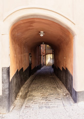 Obraz premium Narrow street in Old Town in Stockholm, Sweden