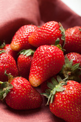 Fresh red strawberry on wooden table, organic fruits.