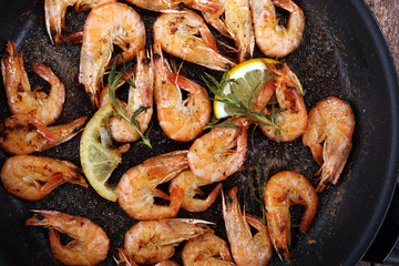 Grilled shrimp skewers. Seafood, shelfish. Shrimps Prawns skewers with herbs, garlic and lemon.