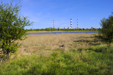 Warsaw, Poland - Siekierki Power and Heat Plant in Czerniakow quarter of Warsaw neighboring Czerniakowskie Lake nature reserve © Art Media Factory