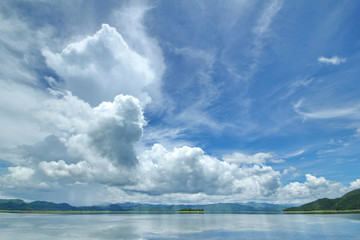 The Islands and mountains on reservior in dam. On the day of clouds and cloud reflection in the beautiful water of  KaengKrachan National Park.