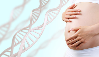 Young pregnant woman caress belly among DNA stem. - 204904723