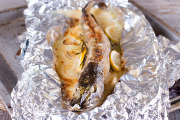 Baked fish with lemon and rosemary