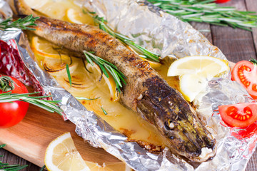 Baked fish with lemon and rosemary
