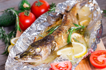 Baked fish with lemon and rosemary