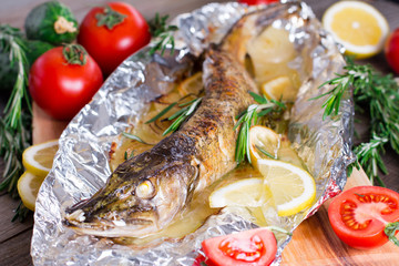 Baked fish with lemon and rosemary