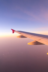 Obraz premium Clouds and sky sunny day through airplane window