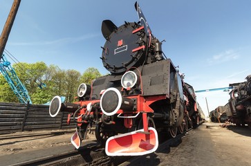 Obraz premium retro locomotive on blue sky