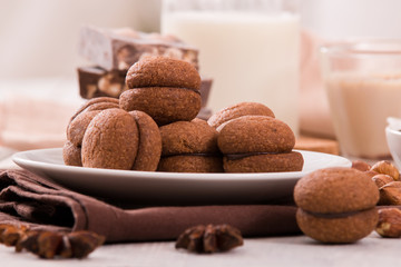 Hazelnut shortbread sandwiches filled with chocolate cream.