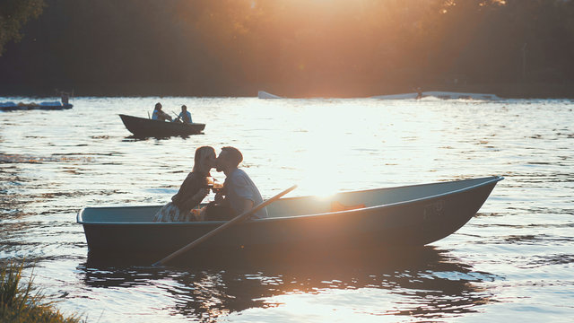 Kissing couple in a boat
