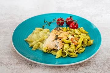 tasty pasta with salmon on a the table
