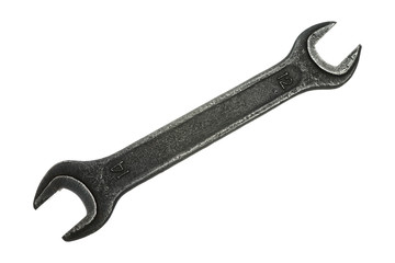 Old grungy wrench on white background. Isolated image of antiquare spanner.