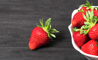 strawberry on a black background.