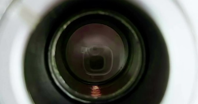 man looks by the house or hotel peephole of door with hand and see in the hyper speed space with final chroma key green screen, zoom in and zoom out camera movement, future technology and space 