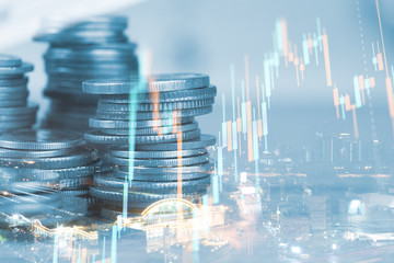 Rows of coin and graph of stock market trade indicator financial for investment strategy.