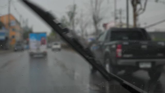 slow motion, car driving in rainy day
