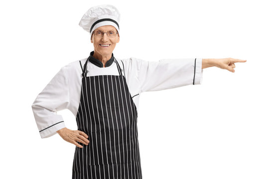 Elderly chef pointing