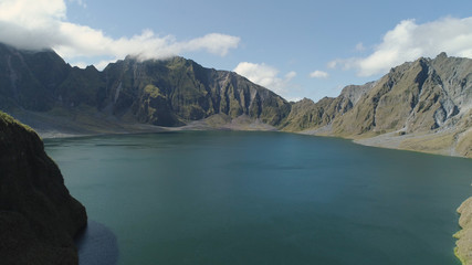 Crater lake of the volcano Pinatubo among the mountains, Philippines, Luzon. Aerial view beautiful landscape at Pinatubo mountain crater lake. Travel concept