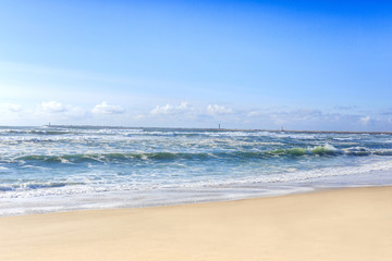 Fototapeta na wymiar Beautiful ocean waves on the sand beach.