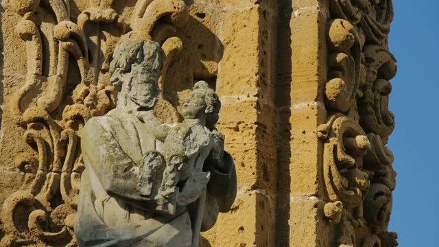 Statue on the 18th century column in Piazza Salandra in Nard&ograve;, in the south of Italy.